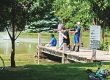 Family fishing together at Elizabethtown / Hershey KOA Holiday during a relaxing long weekend in Central Pennsylvania