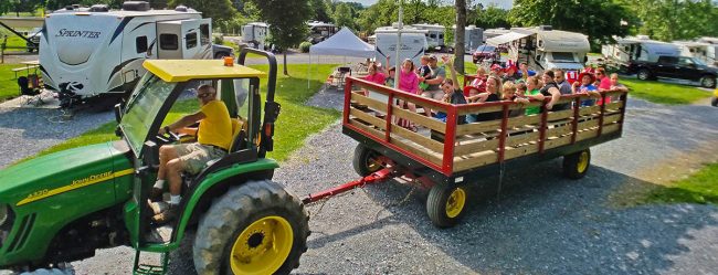 Family Wagon Ride at Elizabethtown / Hershey KOA Holiday Families enjoying a wagon ride at Elizabethtown / Hershey KOA Holiday during their Central Pennsylvania vacation