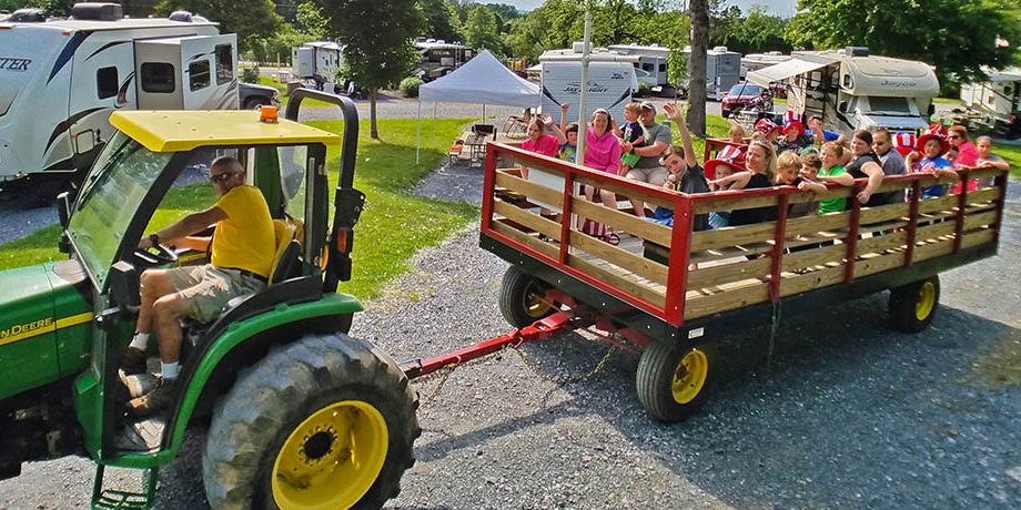 Family Wagon Ride at Elizabethtown / Hershey KOA Holiday Families enjoying a wagon ride at Elizabethtown / Hershey KOA Holiday during their Central Pennsylvania vacation