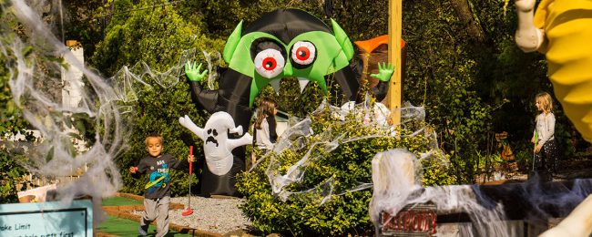 Children enjoying Halloween decorations during a family camping weekend at Elizabethtown / Hershey KOA Holiday