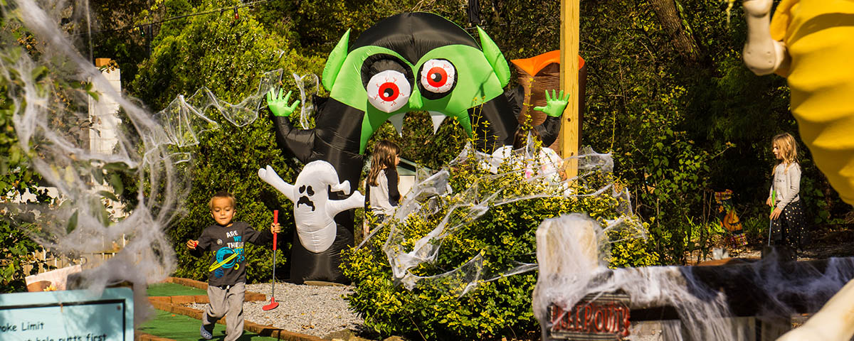 Children enjoying Halloween decorations during a family camping weekend at Elizabethtown / Hershey KOA Holiday