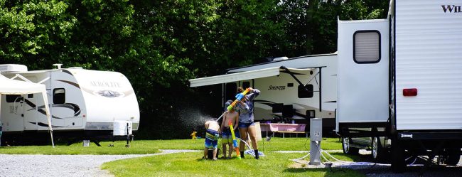 KOA Family Vacation Fun at Elizabethtown / Hershey KOA Holiday Family enjoying outdoor fun together at their RV campsite at Elizabethtown / Hershey KOA Holiday