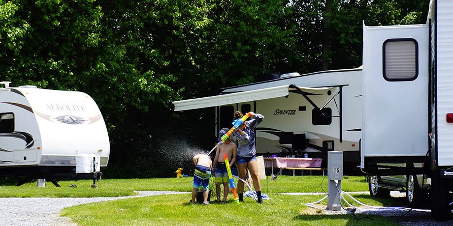 KOA Family Vacation Fun at Elizabethtown / Hershey KOA Holiday Family enjoying outdoor fun together at their RV campsite at Elizabethtown / Hershey KOA Holiday