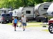 Guests walking through the RV sites at Elizabethtown Hershey KOA Holiday near Hershey Pennsylvania