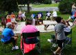 Families gathering around a campfire at Elizabethtown / Hershey KOA Holiday