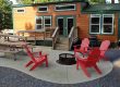 Deluxe Cabin with private fire pit, picnic table, grill, and outdoor seating at Elizabethtown / Hershey KOA Holiday near Hershey, Pennsylvania